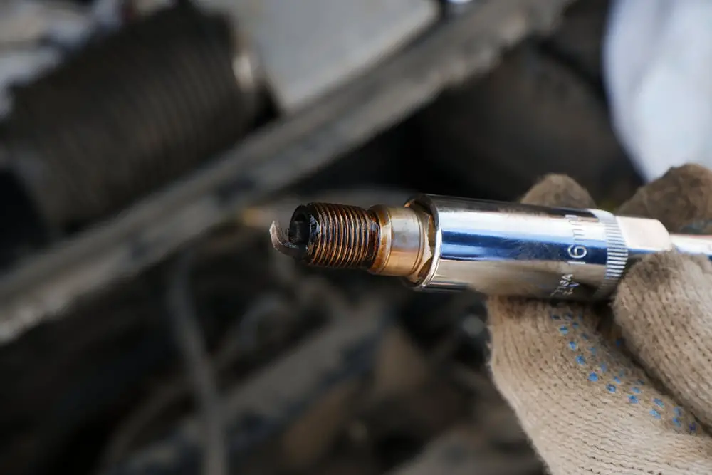 Will oil on spark plugs cause car not to start